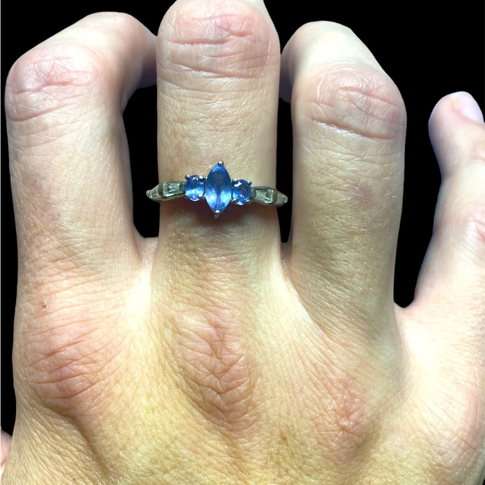 Sterling silver and purple stone ring